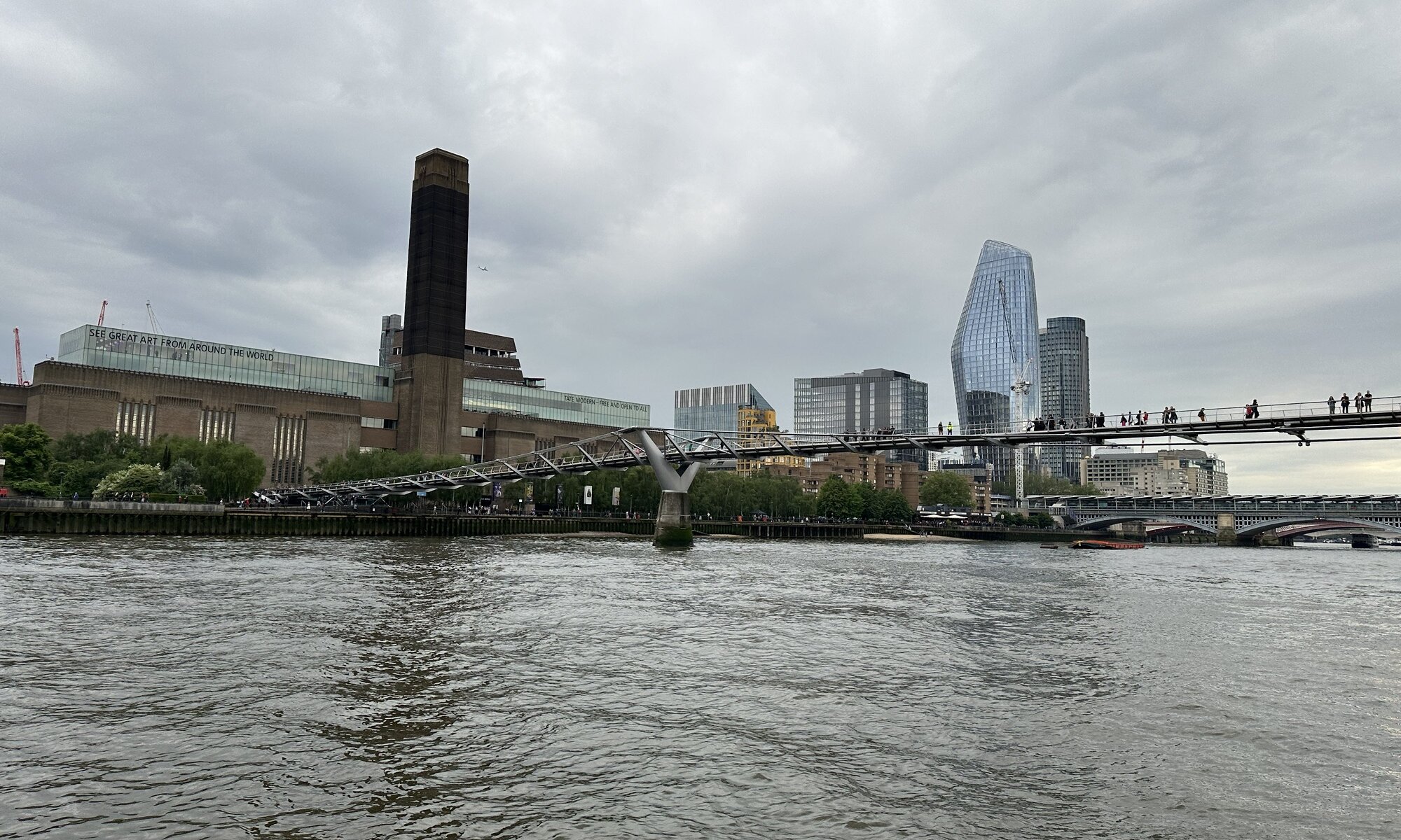 Millenium bridge seen from ferry boat, London